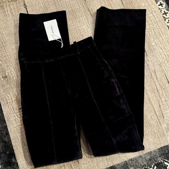 FRAME Slim Stacked Velvet Trousers in Black. - Picture 5 of 10